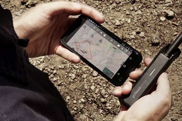 operator holding phone and gotenna pro x with atak app