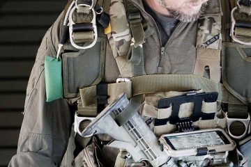 defense operator with chest mounted ATAK app on phone
