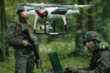 Defense operators with UAV in forest