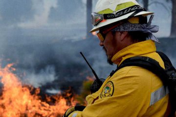 firefighter fighting wildfire