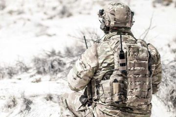 defense operator with Pro X device on back