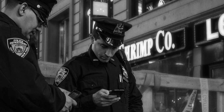 police officers with smart phones