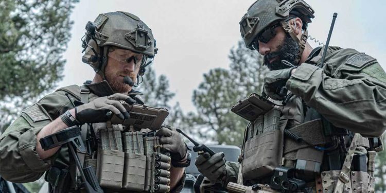 Tactical law enforcement using the goTenna Pro app on their smartphones during a training exercise