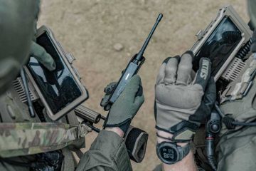 Tactical law enforcement operators with mounted mobile phones and goTenna Pro
