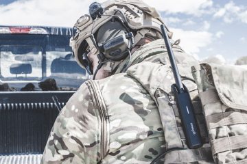 Notional photo of a U.S. military soldier using goTenna Pro mesh networking radio device in the field for off-grid communications